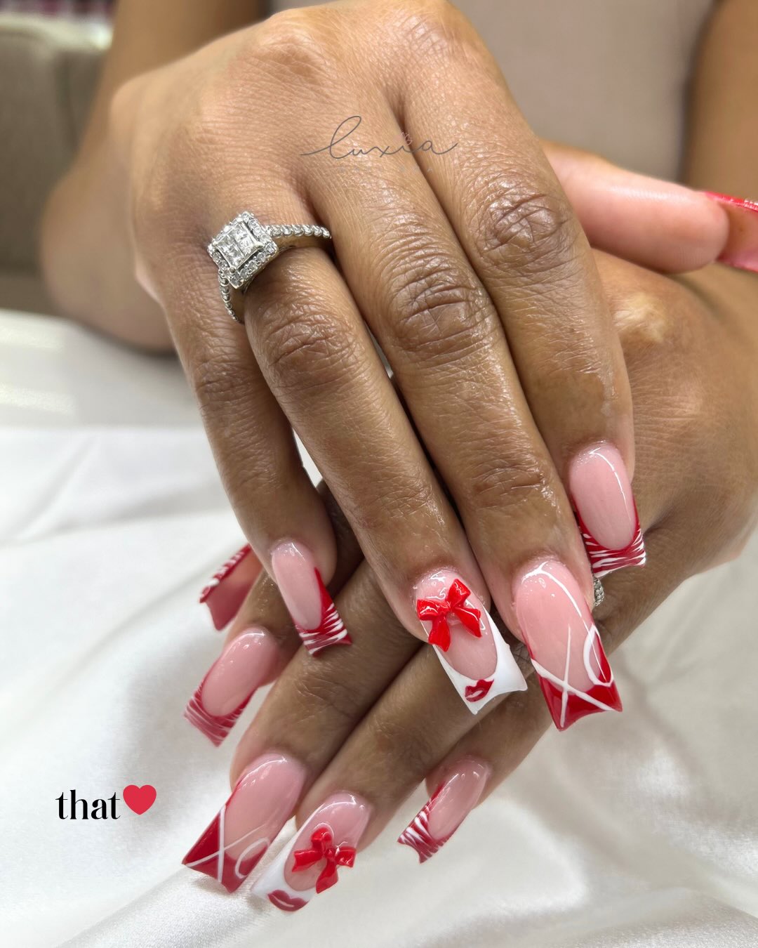 Valentine design with red bows, lips, and polka dots